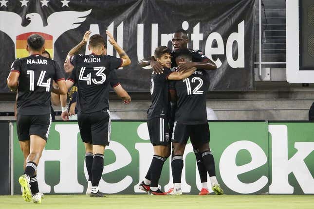 Sep 2, 2023; Washington, District of Columbia, USA; D.C. United forward Christian Benteke (20) celebrates with teammates after scoring a goal against Chicago Fire during the first half at Audi Field.