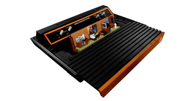 The Lego 2600, with its top slid forward revealing a diorama of a 1970s living room.