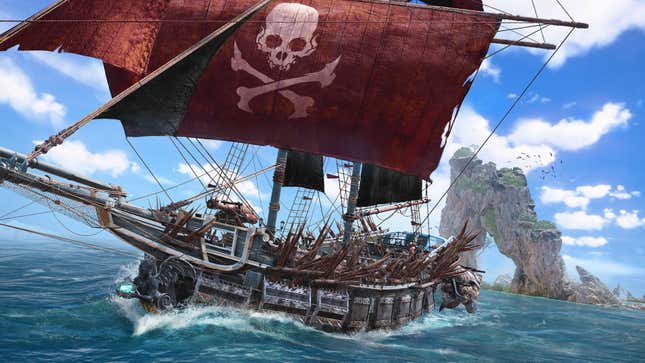 A pirate ship sails beneath blue skies. 