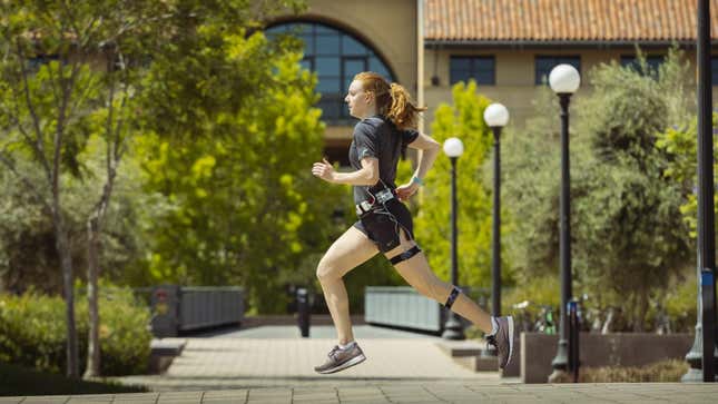 Stanford graduate student, Delaney Miller, wearing the energy expenditure monitoring system while running on campus