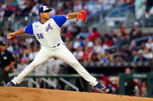 Aug 19, 2023; Cumberland, Georgia, USA; Atlanta Braves relief pitcher Yonny Chirinos (56) cycles through a pitch against the San Francisco Giants during the fourth inning at Truist Park.