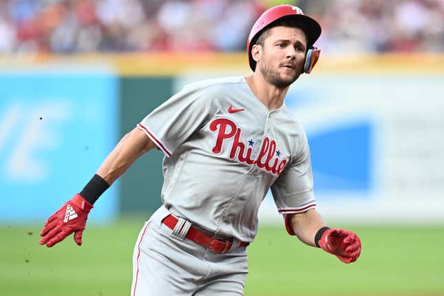 Jul 21, 2023; Cleveland, Ohio, USA; Philadelphia Phillies shortstop Trea Turner (7) rounds second base en route to a triple during the third inning against the Cleveland Guardians at Progressive Field.