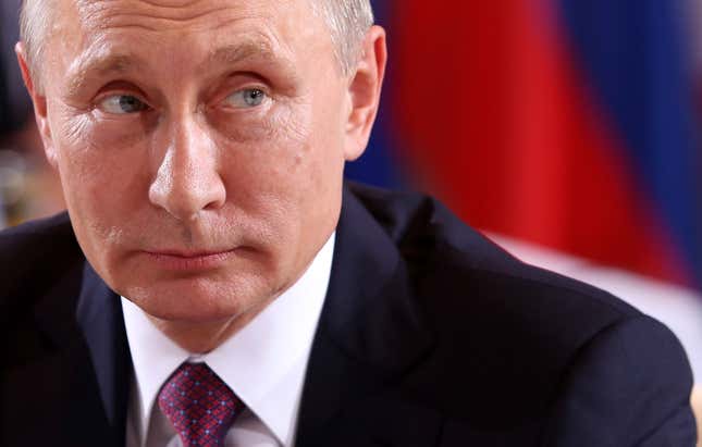 Close-up of Vladimir Putin looking off to the side