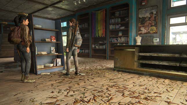 Dina and Ellie are seen standing in a dilapidated bookstore, with a weathered Pride flag seen hanging in the background.