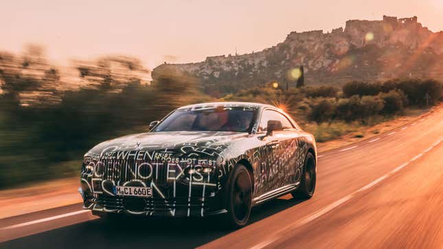 A photo of a camouflage Rolls Royce Spectre driving on a highway. 