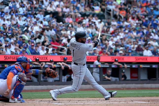 Jul 20, 2023; New York City, New York, USA; Chicago White Sox second baseman Elvis Andrus (1) follows through on an RBI sacrifice fly against the New York Mets during the second inning at Citi Field.