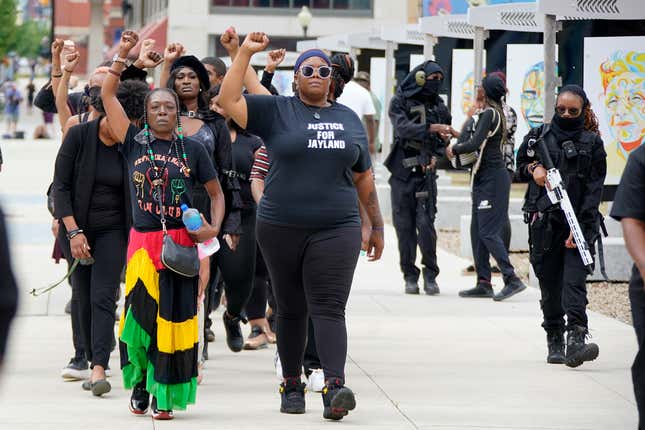 A group arrives to pay their respects at a memorial service in the Akron Civic Center for Jayland Walker in Akron, Ohio, Wednesday, July 13, 2022. On June 27, 2022 Walker was unarmed when Akron police chased him on foot and killed him in a hail of bullets, but officers believed he had shot at them earlier from a vehicle and feared he was preparing to fire again, authorities said.