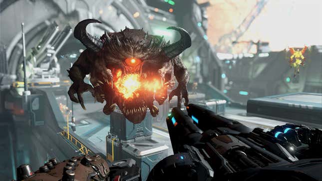doom slayer shoots a cacodemon from first person perspective in doom eternal