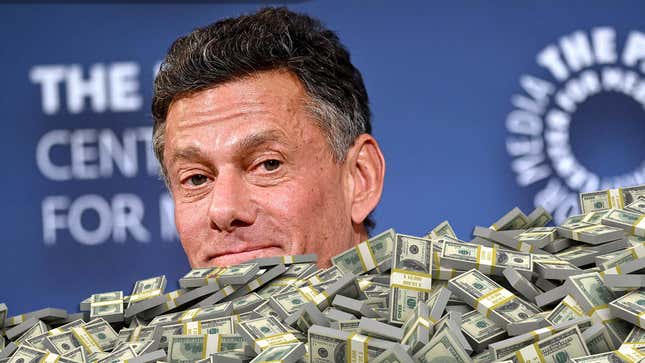 A photo shows Strauss Zelnick buried in a pile of money.