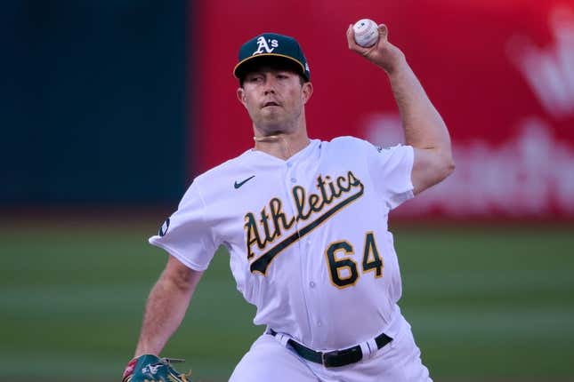 Aug 7, 2023; Oakland, California, USA; Oakland Athletics starting pitcher Ken Waldichuk (64) throws a pitch against the Texas Rangers during the first inning at Oakland-Alameda County Coliseum.
