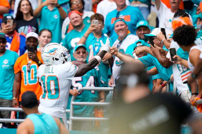 How did fans celebrate Christmas at Dolphins game? See what