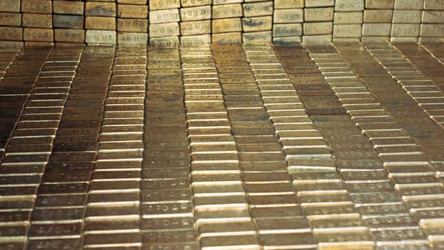 FILE - In a Sept. 24, 1974 file photo gold bars are seen at the U.S. Depository in Ft. Knox, Ky. A new study based on observations from space suggests the gold on Earth came from colliding dead stars in a cataclysmic event that occurred long ago. The research by the Harvard-Smithsonian Center for Astrophysics will appear in a future issue of the Astrophysical Journal Letters. (AP Photo/Barry Thumma, File)