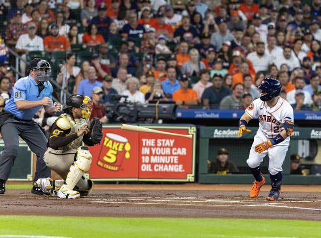 Sep 9, 2023; Houston, Texas, USA; Houston Astros second baseman Jose Altuve (27) throws his bat after he thought he was walked. Instead home plate umpire Quinn Wolcott called him out on strikes in the first inning at Minute Maid Park.