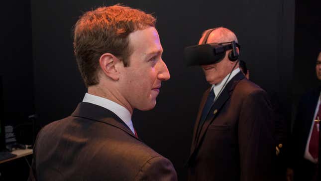 Facebook founder Mark Zuckerberg, seen here alongside Peruvian President Pedro Pablo Kuczynski trying on an Oculus headset at Facebook's booth at the Asia-Pacific Economic Corporation Summit in Lima in November 2016.