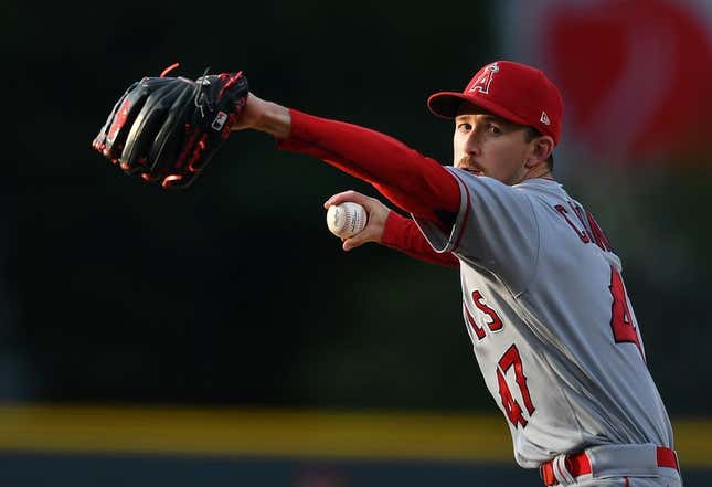 Jun 24, 2023; Denver, Colorado, USA; Los Angeles Angels starting pitcher Griffin Canning (47) delivers a pitch in the first inning against the Colorado Rockies at Coors Field.
