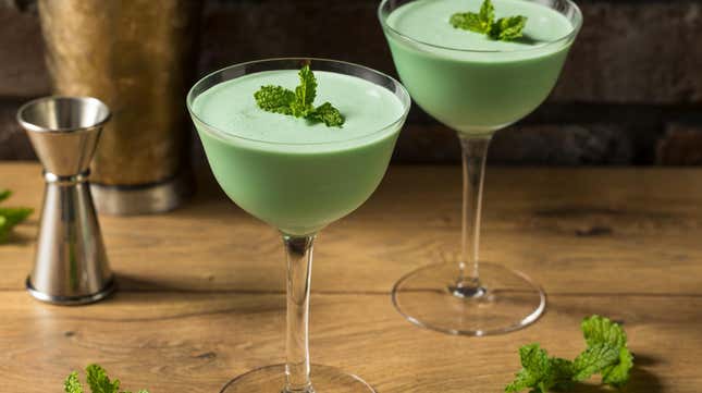 Grasshopper in a coupe glass on a wood surface