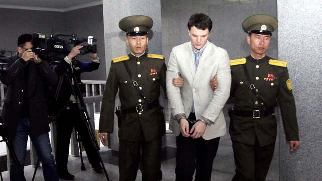 American student Otto Warmbier, center, is escorted at the Supreme Court, Wednesday, March 16, 2016, in Pyongyang, North Korea. North Korea's highest court sentenced Warmbier, a 21-year-old University of Virginia undergraduate student, from Wyoming, Ohio, to 15 years in prison with hard labor on Wednesday for subversion. He allegedly attempted to steal a propaganda banner from a restricted area of his hotel at the request of an acquaintance who wanted to hang it in her church.