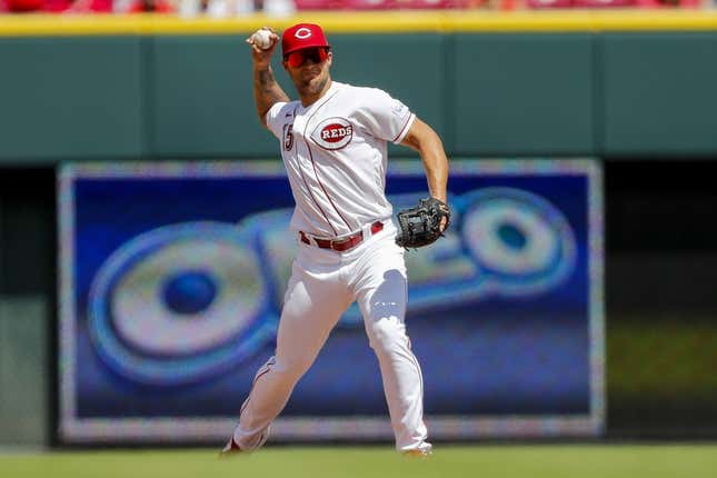 Aug 6, 2023; Cincinnati, Ohio, USA; Cincinnati Reds third baseman Nick Senzel (15) throws to first to get Washington Nationals third baseman Ildemaro Vargas (not pictured) out in the fifth inning at Great American Ball Park.