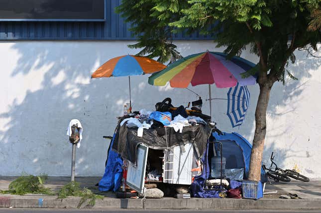A makeshift shelter is seen along Vine St in Los Angeles, California, September 24, 2021. - Los Angeles has seen a surge in homelessness since the start of the coronavirus pandemic with tents, personal belongings and trash popping up on street corners across the city and county. 