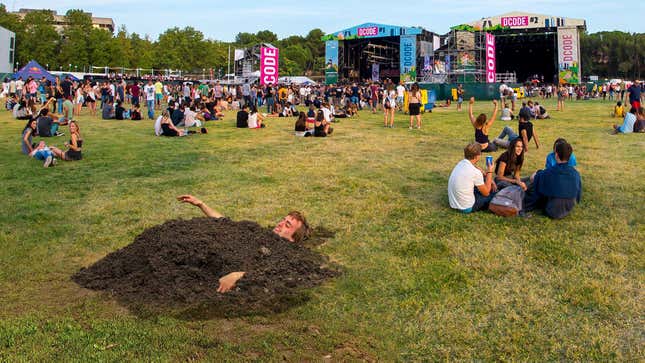 Image for article titled Clever Fan Sneaks Into Music Festival By Burying Self In Dirt There Week Before