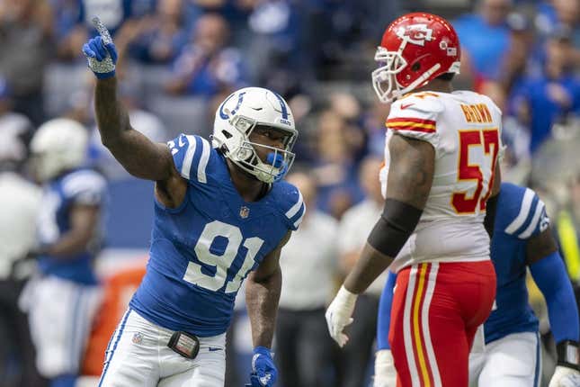 Sep 25, 2022; Indianapolis, Indiana, USA; Indianapolis Colts defensive end Yannick Ngakoue (91) celebrates sacking Kansas City Chiefs quarterback Patrick Mahomes (not pictured) during the second quarter at Lucas Oil Stadium.