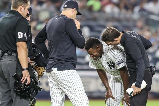 Sep 8, 2023; Bronx, New York, USA;  New York Yankees starting pitcher Luis Severino (40) grimaces after getting injured in the fifth inning against the Milwaukee Brewers at Yankee Stadium.
