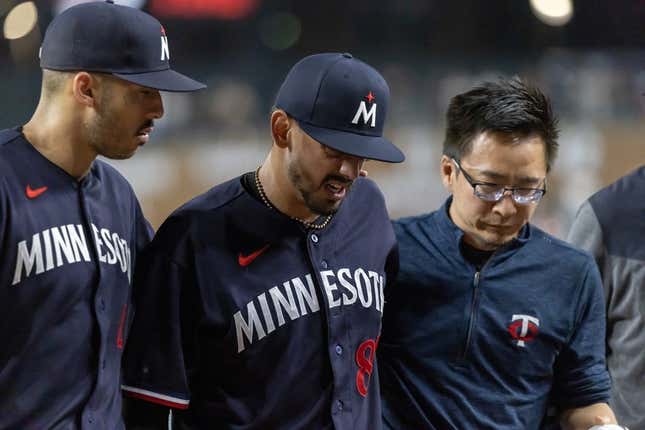 Jun 24, 2023; Detroit, Michigan, USA; Minnesota Twins relief pitcher Jose De Leon (87) leaves the game during his warmups with an injury before the start of the eighth inning against the Detroit Tigers at Comerica Park.
