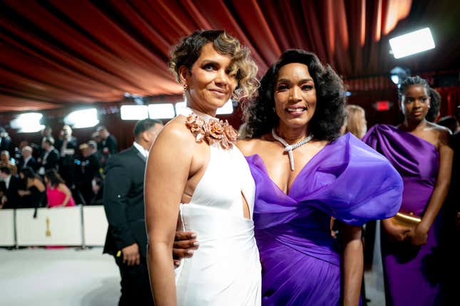 HOLLYWOOD, CALIFORNIA - MARCH 12: (L-R) Halle Berry and Angela Bassett attend the 95th Annual Academy Awards at Hollywood &amp; Highland on March 12, 2023 in Hollywood, California. 