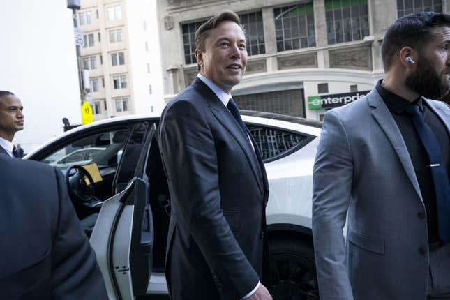 Elon Musk, chief executive officer of Tesla Inc., departs court in San Francisco, California, US, on Tuesday, Jan. 24, 2023. Investors suing Tesla and Musk argue that his August 2018 tweets about taking Tesla private with funding secured were indisputably false and cost them billions of dollars by spurring wild swings in Tesla’s stock price.