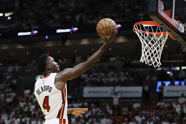 Apr 22, 2023; Miami, Florida, USA; Miami Heat guard Victor Oladipo (4) drives to the basket in the fourth quarter against the Milwaukee Bucks during game three of the 2023 NBA Playoffs at Kaseya Center.