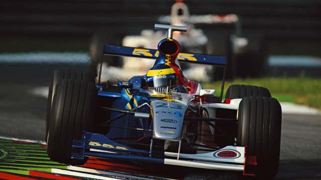 A photo of the BAR F1 car racing in the early 2000s. 
