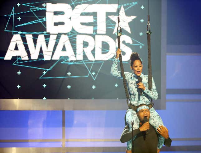 Anthony Anderson and Tracee Ellis Ross perform onstage as hosts of the 2015 BET Awards on June 28, 2015 in Los Angeles, California.