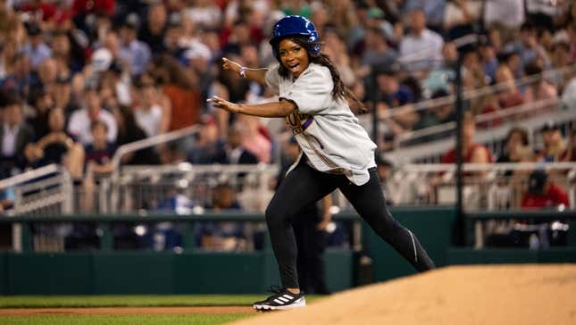 Rep. Jasmine Crockett, D-Texas, attempts to steal second base during Congressional Baseball Game at National Park in Washington on Wednesday, June 14, 2023. 