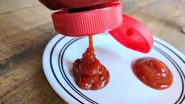 Tapatio ketchup being squirted onto plate, with Heinz ketchup beside it