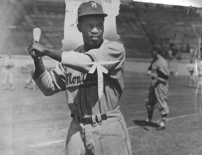 Jackie Robinson (1919 - 1972), later of the Brooklyn Dodgers, stands at the plate waiting for a pitch during a Montreal Royals practice, Montreal, September 14, 1946.