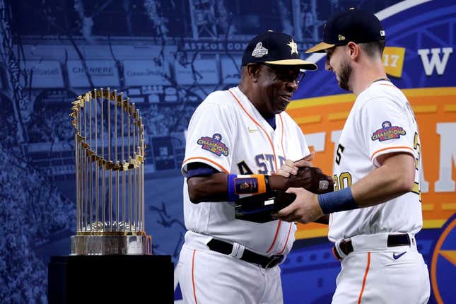 Mar 31, 2023; Houston, Texas, USA; Houston Astros manager Dusty Baker Jr. (12) celebrates with Houston Astros right fielder Kyle Tucker (30) after receiving their 2022 World Series championship rings prior to the game against the Chicago White Sox at Minute Maid Park.