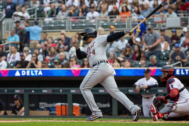 Jun 15, 2023; Minneapolis, Minnesota, USA; Detroit Tigers designated hitter Miguel Cabrera (24) hits single during the second inning against the Minnesota Twins at Target Field.
