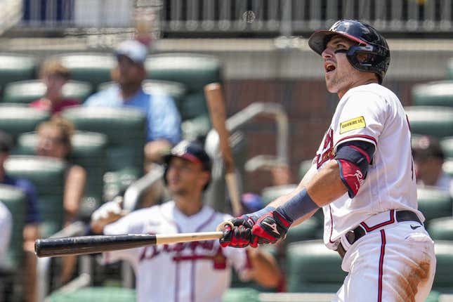 Jul 20, 2023; Cumberland, Georgia, USA; Atlanta Braves third baseman Austin Riley (27) reacts after hitting a home run against the Arizona Diamondbacks during the eighth inning at Truist Park.