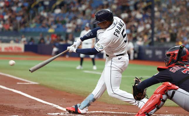 Aug 12, 2023; St. Petersburg, Florida, USA;  Tampa Bay Rays shortstop Wander Franco (5) singles against the Cleveland Guardians during the first inning at Tropicana Field.