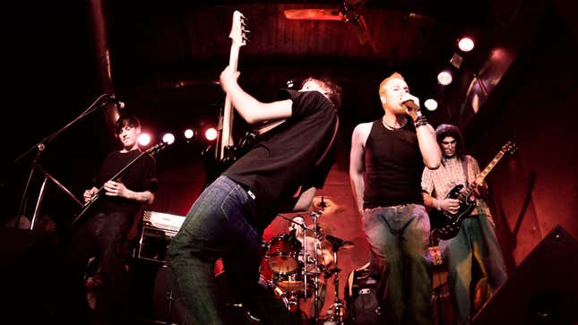 Image for article titled Band Really Busting Asses To Earn Local Concertgoer’s Head Nod