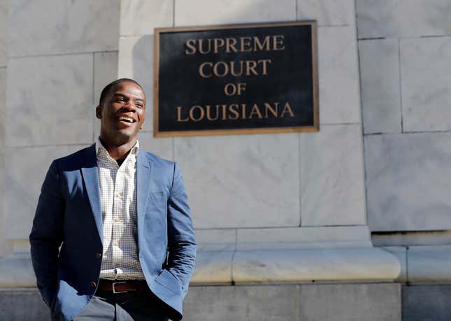Theo Shaw, standing outside the Louisiana Supreme Court where he clerked for the chief justice, in late 2018.