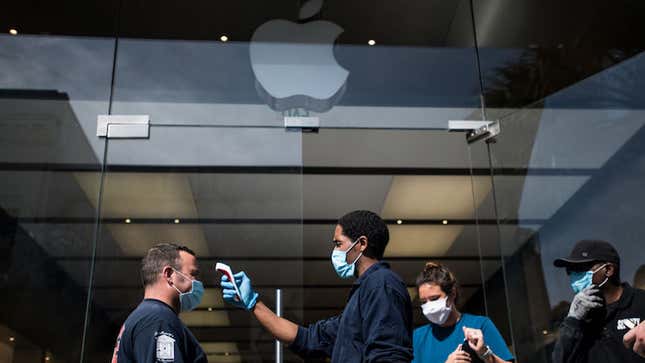 A security guard checked a customer’s temperature outside an Apple Store in Charleston, South Carolina in May.