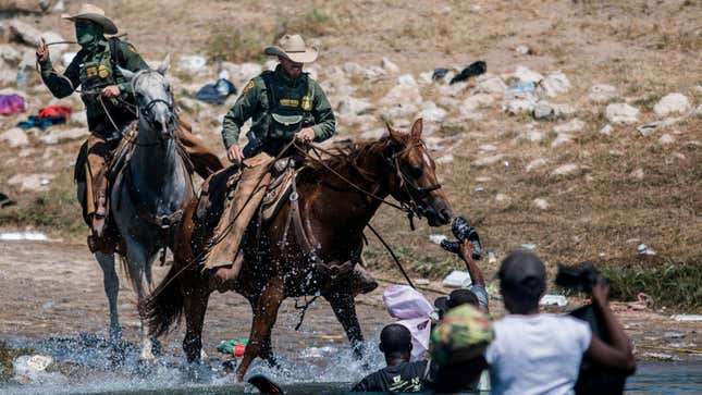 Mounted U.S. Border Patrol agents attempt to contain migrants as they cross the Rio Grande from Ciudad Acuña, Mexico, into Del Rio, Texas, Sept. 19, 2021. The administration began a massive expulsion of thousands of Haitians while allowing thousands of others to stay in the U.S. The uneven response, which at one point included Border Patrol agents on horseback appearing to use reins as whips to corral Haitian asylum seekers, sparked sharp criticism and underscored for many a failed border policy.