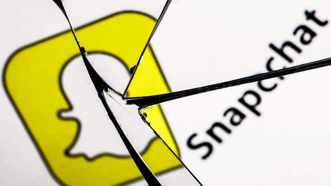 The Snapchat logo is shown reflected in a broken mirror.