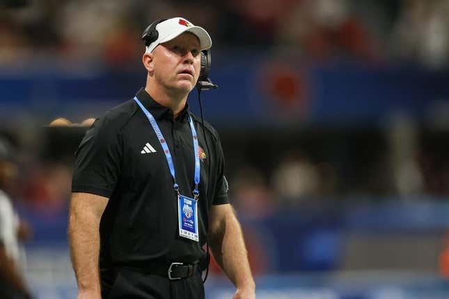 Sep 1, 2023; Atlanta, Georgia, USA; Louisville Cardinals head coach Jeff Brohm on the sideline against the Georgia Tech Yellow Jackets in the fourth quarter at Mercedes-Benz Stadium.