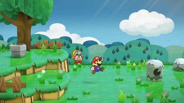 Paper Mario bounds through a green field.