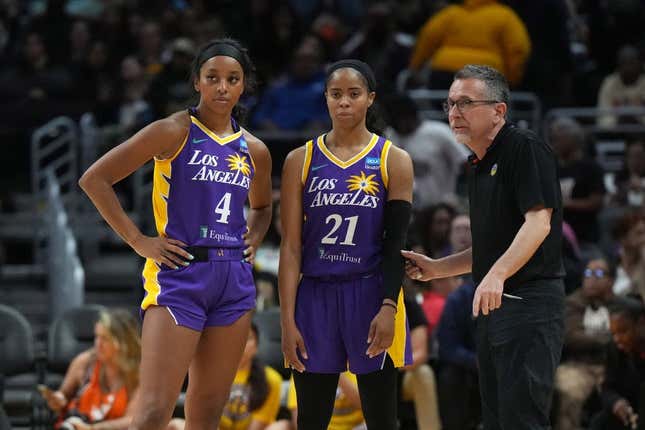 May 25, 2023; Los Angeles, California, USA; LA Sparks guard Lexie Brown (4), guard Jordin Canada (21) and coach Curt Miller react during the second half against the Las Vegas Aces at Crypto.com Arena.