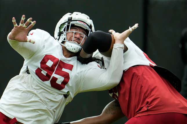 Arizona Cardinals defensive tackle Leki Fotu (95) looks up at a