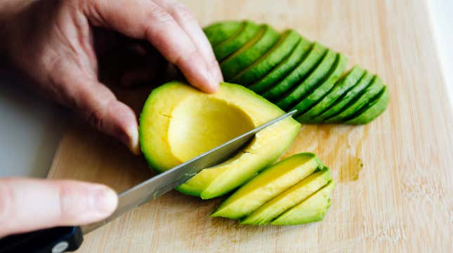 Chef chopping avocado