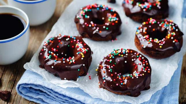 Chocolate devil's food cake doughnuts with sprinkles